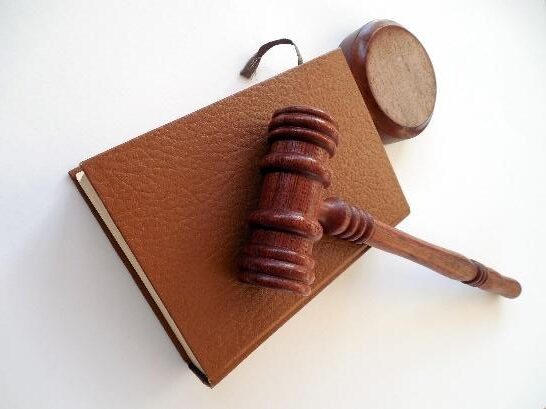 Featured: Judges gavel on law book- Larceny Lawyer