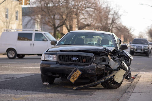 Featured: Damaged car at scene of an accident- leaving the scene of an accident