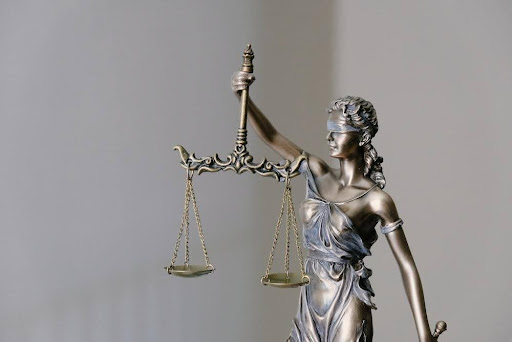 Featured: Lady Justice holding the scales of justice- Rape Criminal Defense Lawyer - FAQ